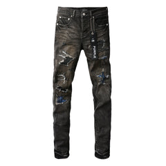 Chic Black Distressed Denim Pants 9080 Combining Rips and Patches for a Modern Style