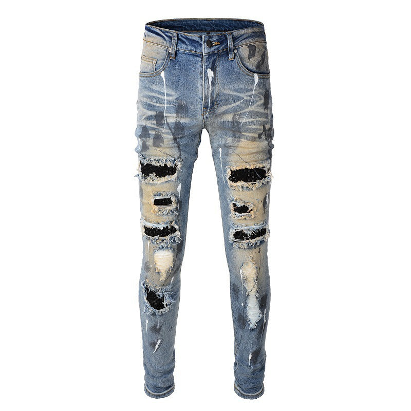 Men's Blue Jeans with Black Patches, Distressed Paint, and Ripped Details (523-6523)