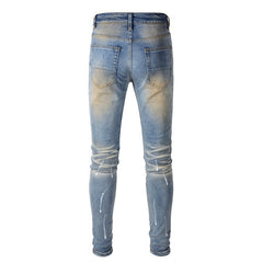 Men's Blue Jeans with Black Patches, Distressed Paint, and Ripped Details (523-6523)
